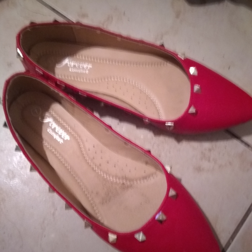 Red studded flats